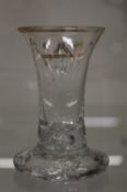 An 18th century Masonic firing glass.
