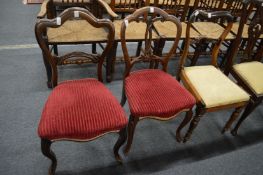Three Victorian dining chairs.
