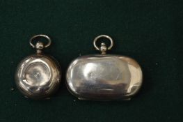 A silver sovereign and half sovereign case and another sovereign case.