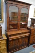 A Victorian mahogany secretaire cupboard bookcase.