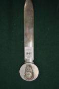 A Christofle plated letter opener.