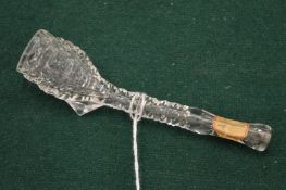 A small cut glass pipe.