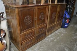 Two Chinese hardwood TV cabinets.