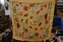 A Burberry silk scarf decorated with sea creatures.
