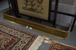 A pierced brass fender.