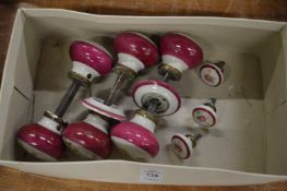 Floral decorated porcelain door knobs and cabinet knobs.