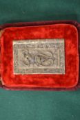 A silver filigree card case with fitted box.