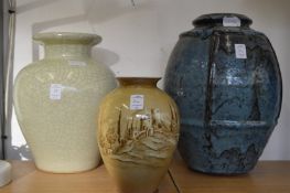 Three decorative vases.