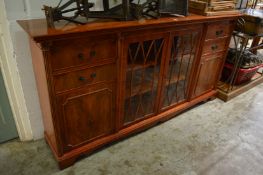 A modern yew wood side cabinet.