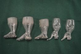 Five various glass hunting boots.
