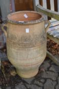 A large terracotta pot.