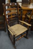 A 19th century elm, rush seated ladderback dining chair.