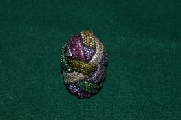 Heavy silver ring with decorative stones.