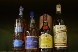 Three bottles of brandy and a bottle of rum.