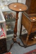 A mahogany tripod jardiniere stand.