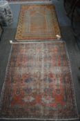 Two Persian rugs, worn, 155cm x 100cm and 130cm x 106cm.