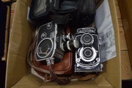 A camera and a cine camera.