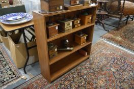 A hardwood open bookcase.