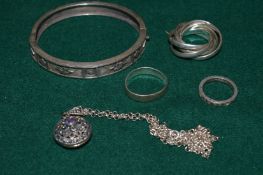 Six pieces of silver jewellery.