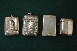 A group of four silver and plated vesta cases.