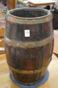 A brass bound barrel shaped bucket.