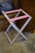 Decorative folding suitcase or tray stand.