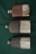 Three hip flasks.