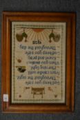 Framed and glazed sampler.