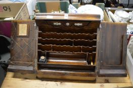 A large oak tabletop stationery box.