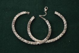 Two diamante bracelets.