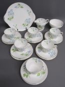 Shelley American Brooklime 14011 tea set comprising 6 teacups, saucer, sideplates, milk jug, sugar