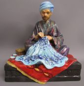 'Embroiderer of Kashmir' by studio potter Reg Johnson - approx. 18cm x 17cm x 13cm