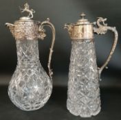 2 Victorian cut glass claret jugs with silver plated mounts - one with Bacchus mask spout, the