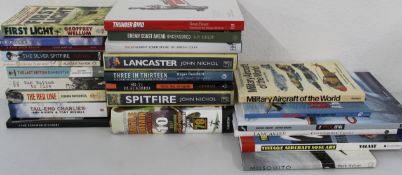 A selection of over 20 books on aviation, soft and hard back