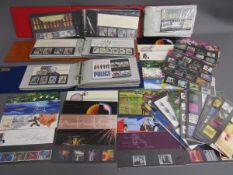 Collection of Royal Mail mint stamps includes 4 binders and loose packs