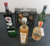 Collection of spirits, including Martini, Martini Rosso, salted caramel vodka, clementine gin,