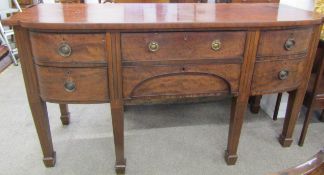 Georgian mahogany bow fronted sideboard with ebony stringing, ring handles on tapering legs with