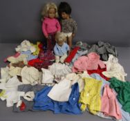3 Sasha dolls and a collection of clothing - baby doll with blonde hair - brunette boy with brown