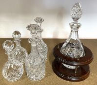 Port decanter in stand & two pairs of crystal decanters