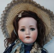 Max Handwerk Bebe Elite bisque head doll with composition body, sleeping eyes, open mouth with