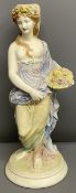 Copeland bisque figurine/candlestick of a classical lady with a basket of flowers Ht 40cm