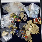 41 loose enamel and gilt metal Golly badges plus 9ct gold plated Farewell Golly badge, with
