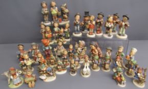 Goebel Hummel figures includes Apple Tree boy and girl, sitting on the fence, carol singers etc also