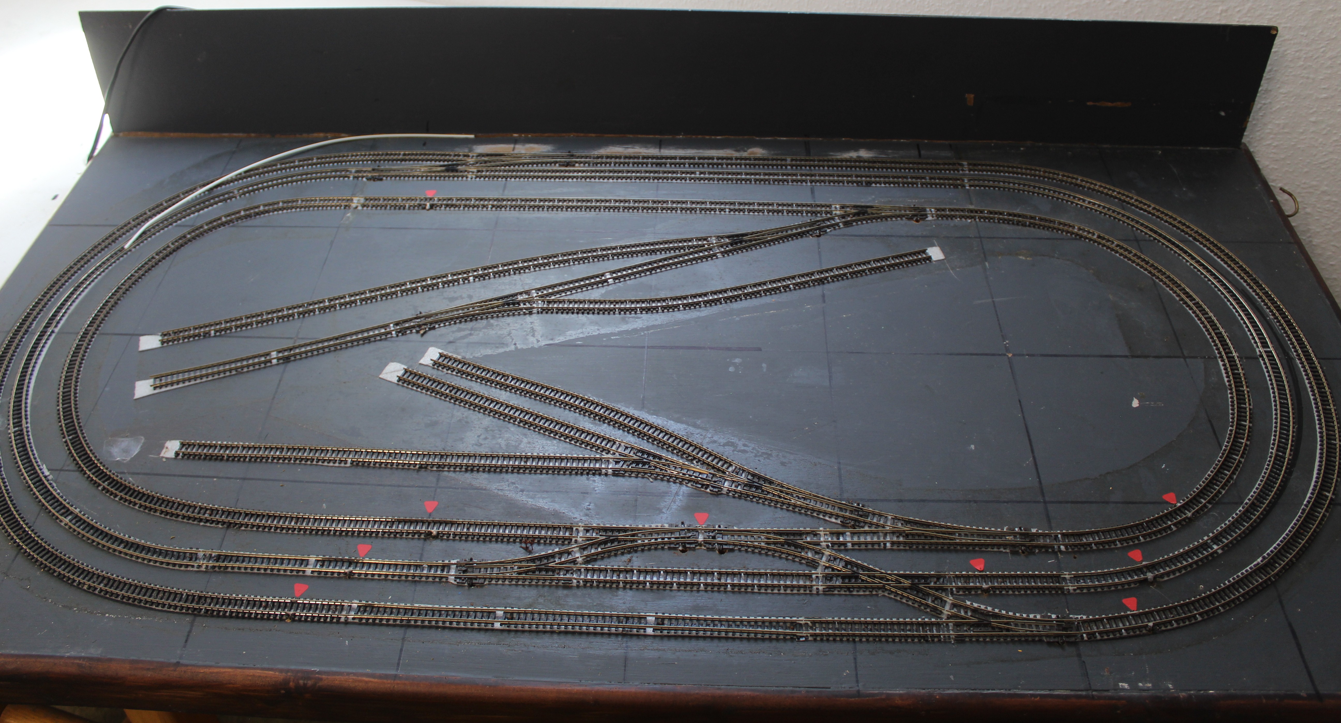 N Range Railway track layout fixed on board with controller approx 1200mm x 900mm and range of