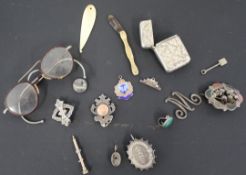 Mixed selection of silver and white metal items, pair of vintage glasses, badges, vesta, stamp
