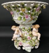 Von Schierholz foliage encrusted rococo style porcelain comport centrepiece with cherub