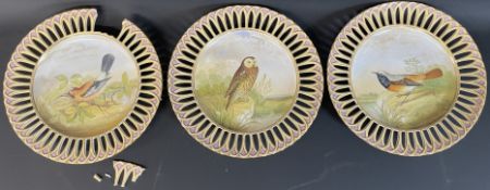 Three Victorian Copeland cabinet ribbon plates with central bird decoration (one with broken