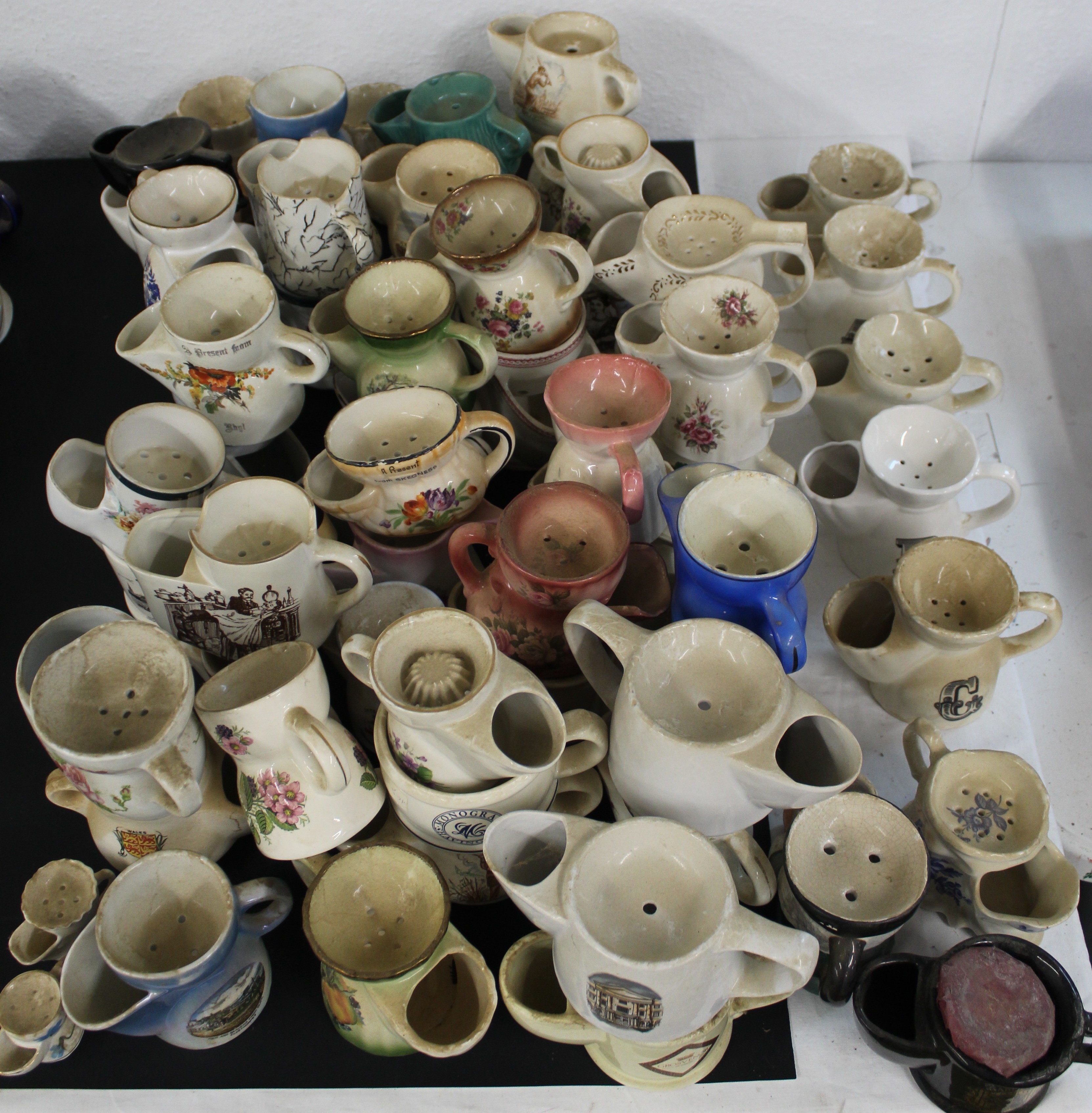 Over 60 shaving mugs of various design and commemorative