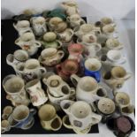 Over 60 shaving mugs of various design and commemorative