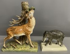 Early 20th century Spode Copeland China stag by a tree stump Ht 25cm & an elephant with glass eyes